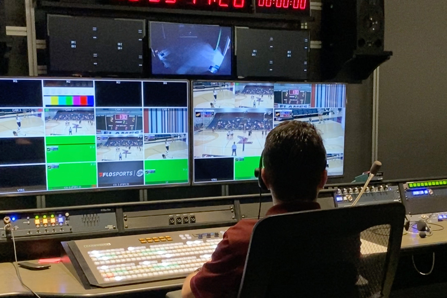 An image of Joshua directing a volleyball game on FloSports.